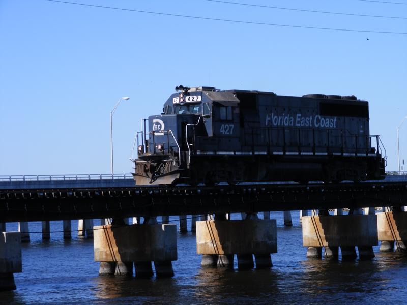 Southbound FEC train crossing the Stuart Bridge in Stuart, FL