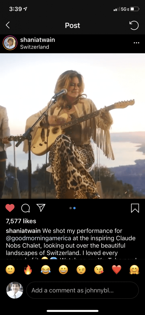 Screenshot of Shania Twain playing the guitar while in Switzerland.