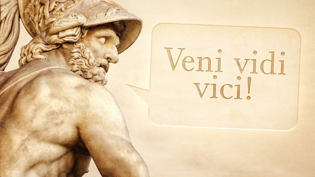 The Roman sculpture of Menelaus with the message I came, I saw, I conquered in latin language